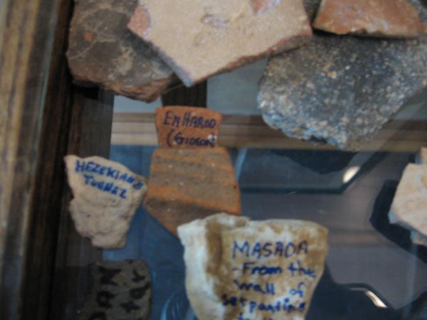 Pieces from En Harod where Gideon's men drank and latter broke their clay jars going into battle. Also a rock from the Serpantine Trail coming down the side of Masada. A small stone from Hezekiah's tunnel picked up under the city of David, the Jerusalem of the Old Testament.