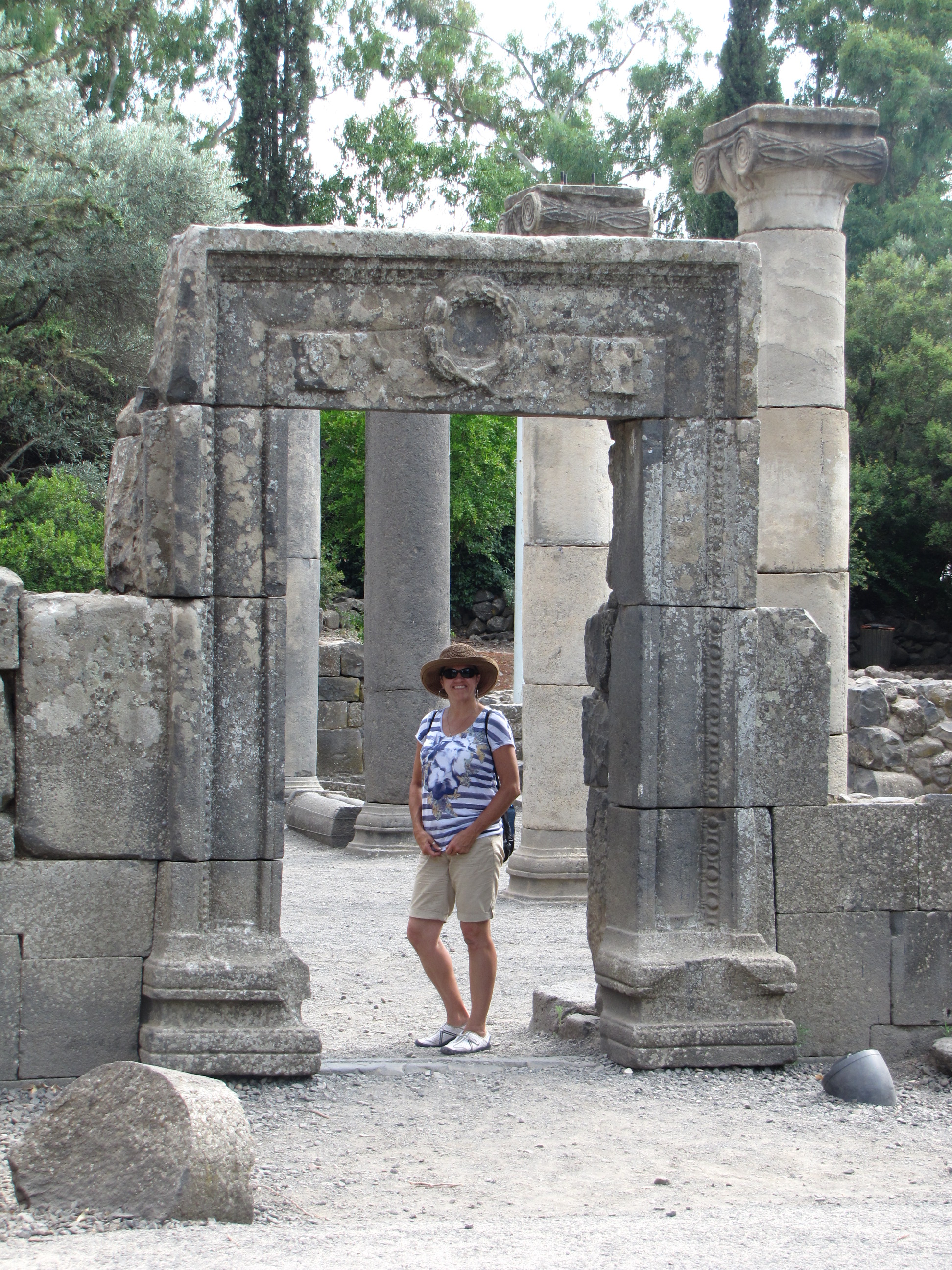 Toni standing under the Lintel over doorway of Qatsrin (Katzrin) Synagogue of 300-500 AD